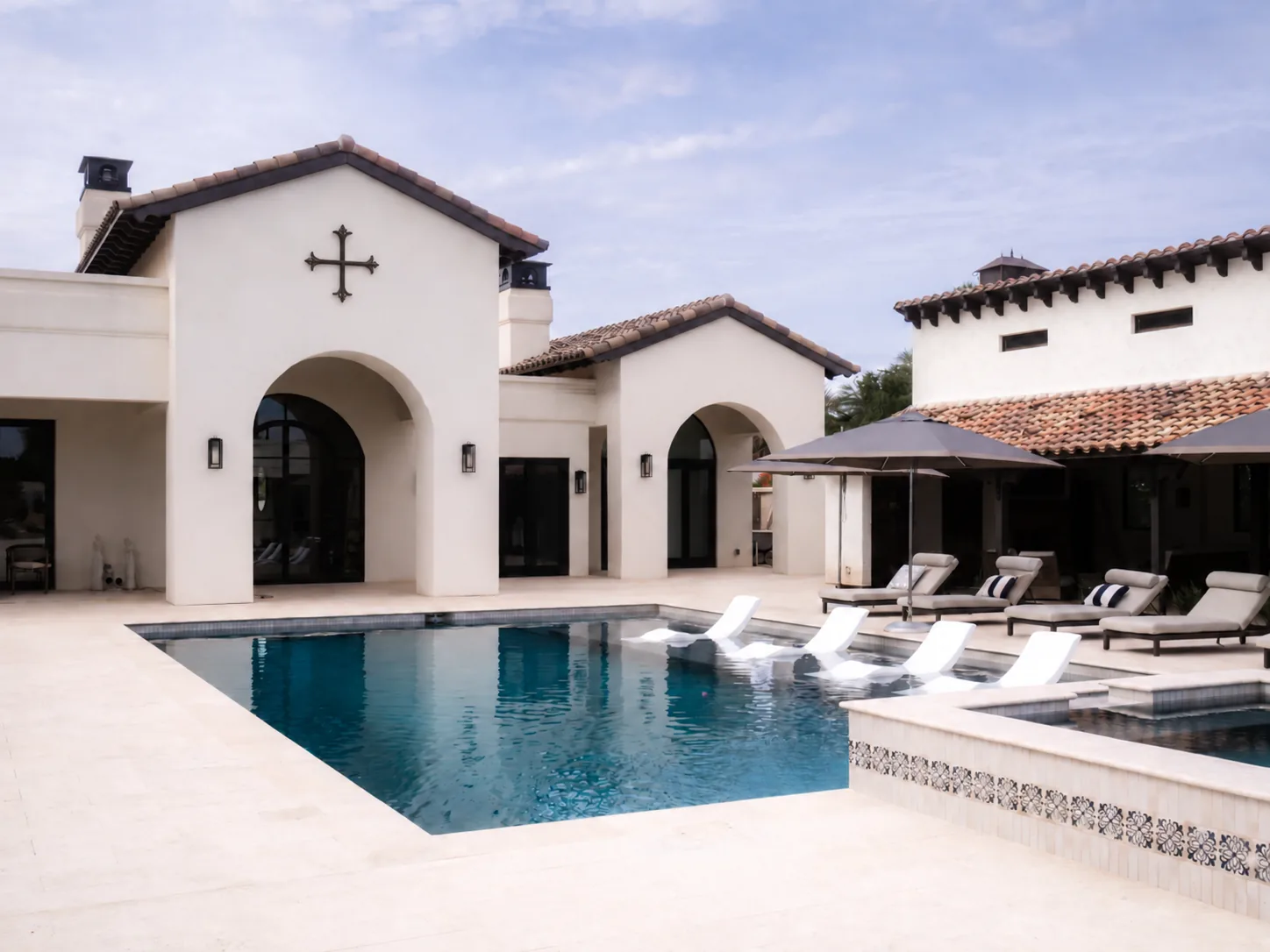 Scottsdale residence with an arched loggia opening onto the pool